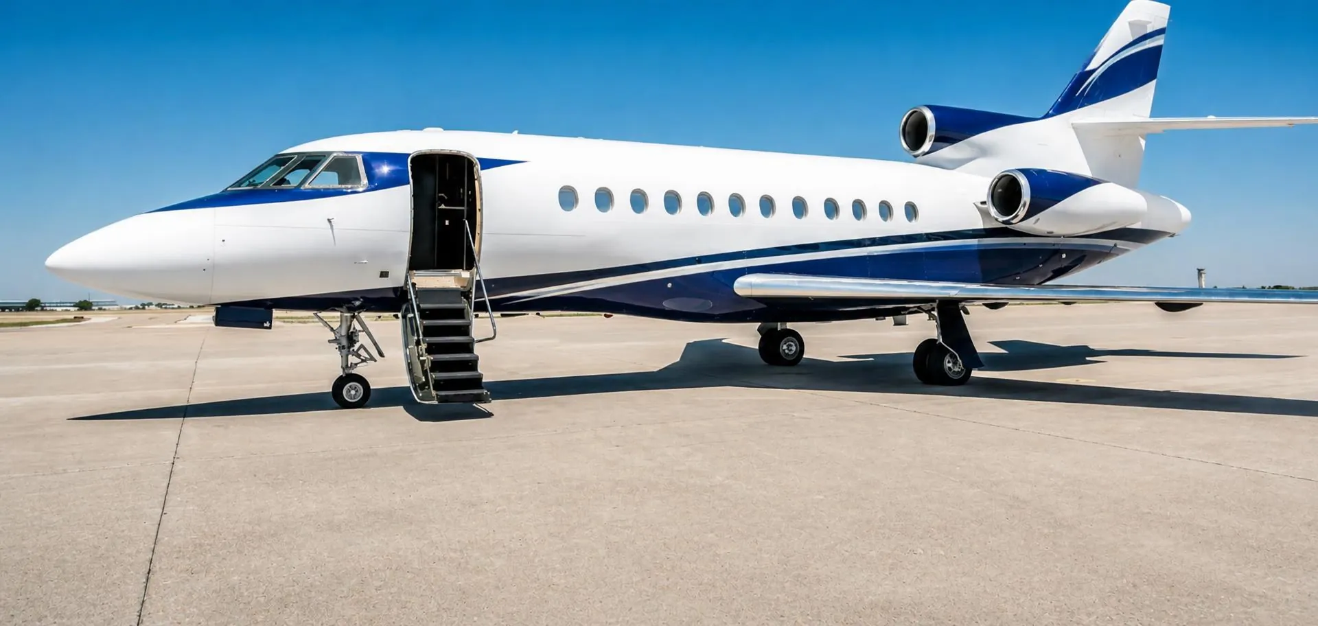 Business jet parked on the ramp with its airstairs lowered